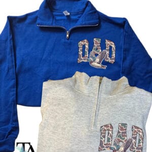 2 Quarter zipped sweatshirts with a front chest patch that says DAD in capital letters. The text contains a camo print and a wild duck flying underneath the letters. Great for fathers day gifts, birthday for dad and new dad gift.