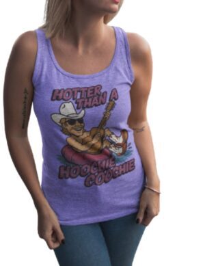 Heather purple Comfort Colors women’s racerback tank top with vintage distressed tubing illustration and bold ‘Hotter Than a Hoochie Coochie’ text — southern country girl summer shirt, Moncton New Brunswick boutique tank top, soft breathable cotton blend for music festivals, lake days, rodeos, Nashville concert outfits, bachelorette party tees, rural aesthetic countrywear, Tamarack Treasures women’s apparel